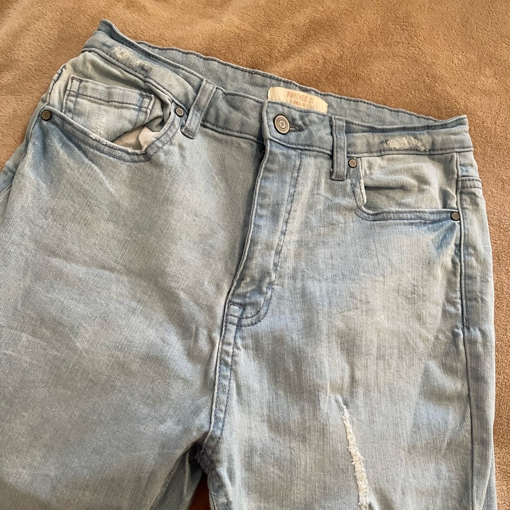 Size US 28 Slightly Ripped Blue Jeans from Forever 21